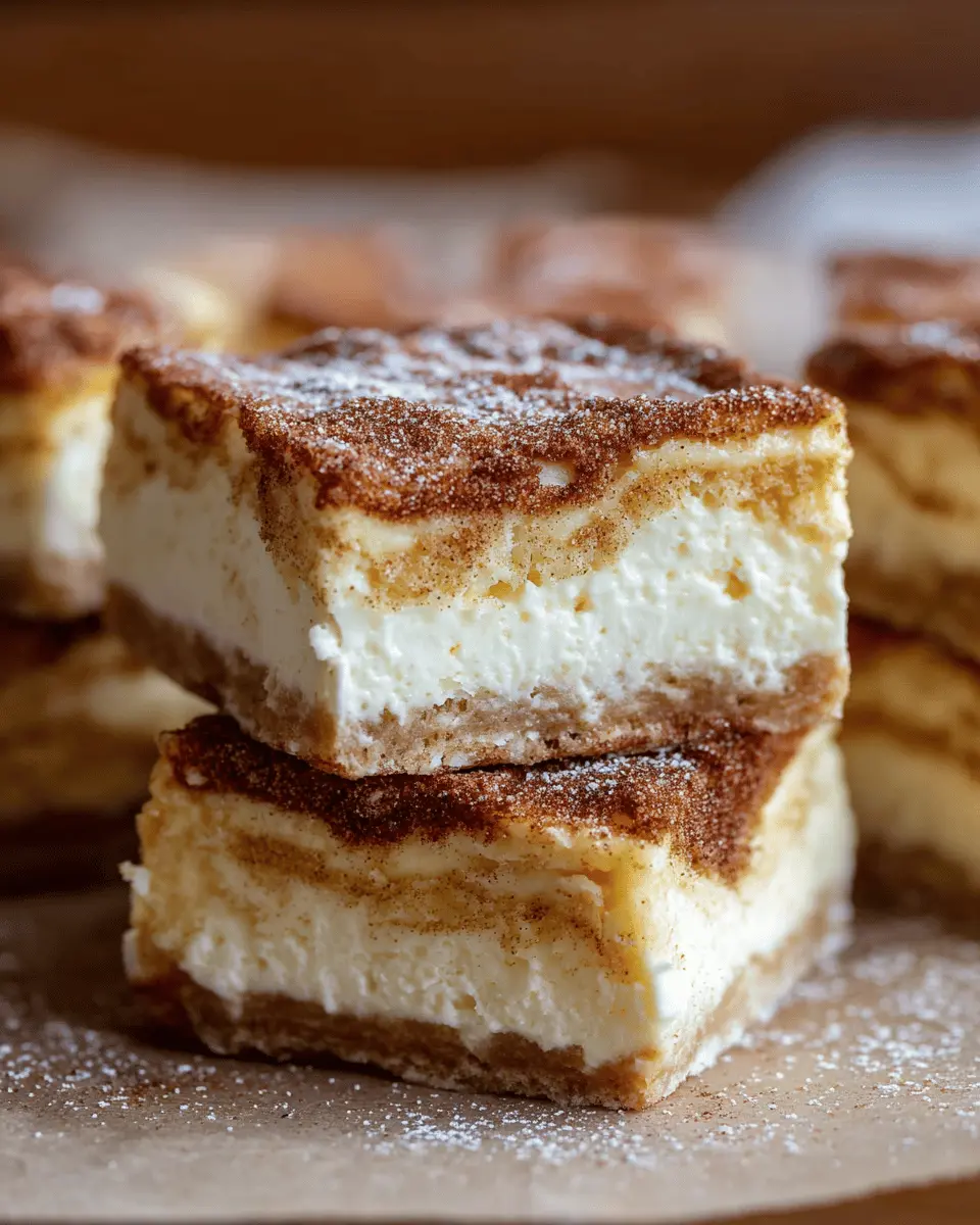 Churro Cheesecake Bars: Indulgent Treat with Cinnamon Sugar Twist